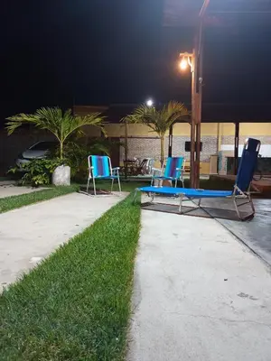 A piscina em ou perto de Chalé dos Coqueiros em Paracuru