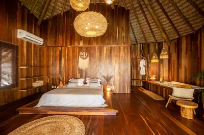 Uma cama ou camas num quarto em Rancho Noé Cumbuco