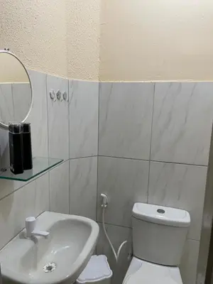 Uma casa de banho em Pousada perto do mar