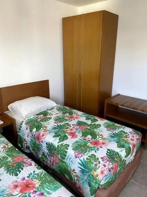Uma cama ou camas num quarto em Flat no Coração do Meireles - Apto 1906