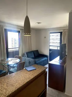 Uma área de estar em Flat no Coração do Meireles - Apto 1906