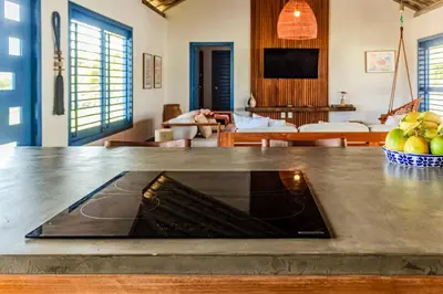 Uma televisão e/ou sistema de entretenimento em Casa de Praia Perfeita