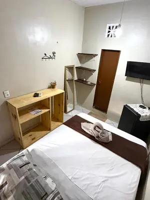 Uma cama ou camas num quarto em Pousada Praiana Jericoacora