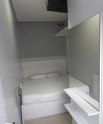 Uma cama ou camas num quarto em Pousada Do Futuro