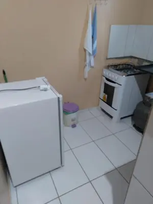 A cozinha ou kitchenette de kitinete - SALVATERRA GUARAMIRANGA