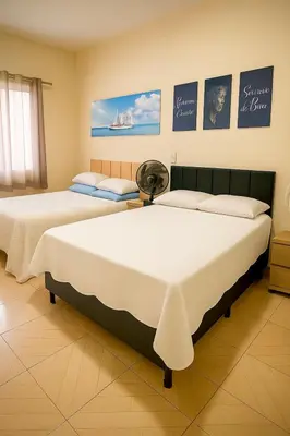 Uma cama ou camas num quarto em Apartamento completo Excelente localização Centro