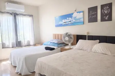 Uma cama ou camas num quarto em Apartamento completo Excelente localização Centro