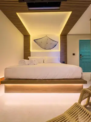 Uma cama ou camas num quarto em Poozendin Hotel de Charme