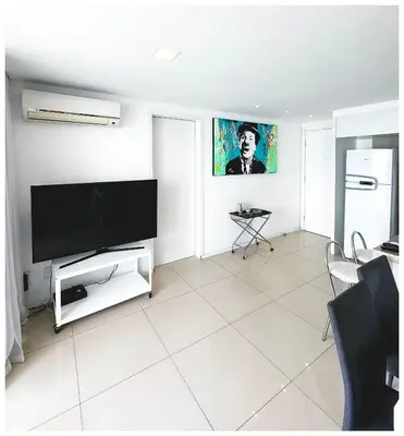 Uma televisão e/ou sistema de entretenimento em Porto Jangada by Holiday Stays