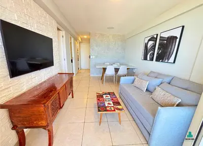 Uma televisão e/ou sistema de entretenimento em Beach Village Vista Mar by Holiday Stays
