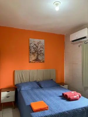 Uma cama ou camas num quarto em Apartamento completo e central! Casa Rute!