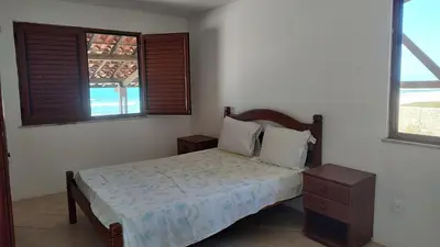 Uma cama ou camas num quarto em Casa de Praia Iguape Ceará Paraíso