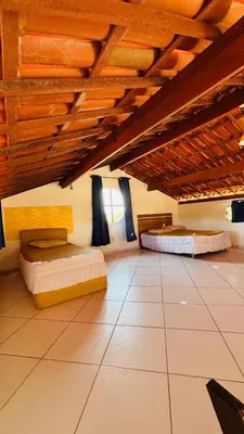 Uma área de estar em Loft Rústico com Vista Para a Piscina