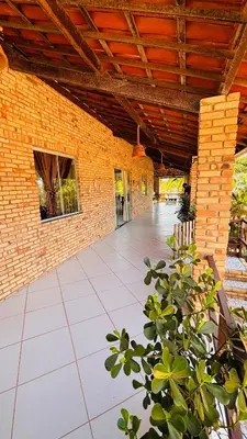 Uma varanda ou terraço em Loft Rústico com Vista Para a Piscina