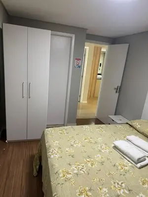 Uma cama ou camas num quarto em Ed Preamar 901 Próximo à Feirinha da Beira Mar