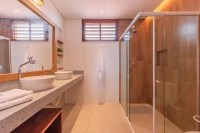 Uma casa de banho em Casa LadoMar em Mundaú por Carpediem