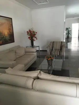 Uma área de estar em Homestay Fortaleza
