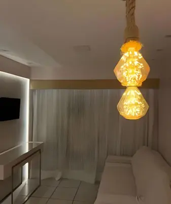 Uma televisão e/ou sistema de entretenimento em Apartamento em Beach Class Praia de Iracema Por CasAmarInn