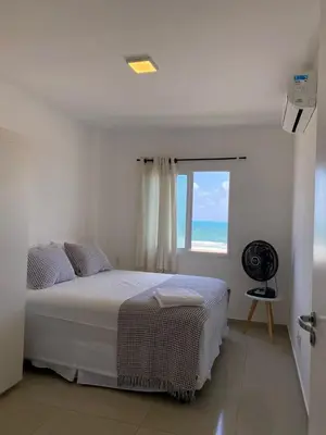 Uma cama ou camas num quarto em VG Fun Beach Front Apartamentos
