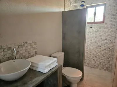 Uma casa de banho em Vila das Pedras