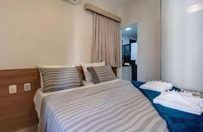 Uma cama ou camas num quarto em Flat Mar Azul - Beira Mar Fortaleza