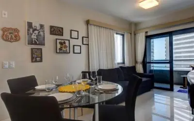 Uma área de estar em Flat Mar Azul - Beira Mar Fortaleza