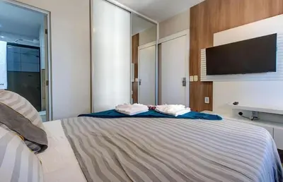 Uma cama ou camas num quarto em Flat Mar Azul - Beira Mar Fortaleza