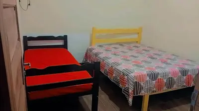 Uma cama ou camas num quarto em Casa de Praia no Iguape Ce.