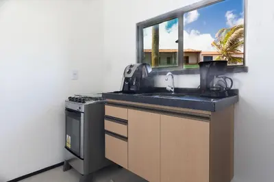 A cozinha ou kitchenette de Beachfront Duplex #A10 em Barro Preto by Carpediem