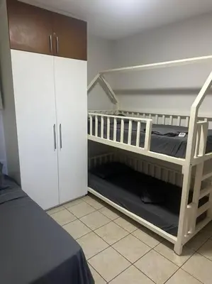 Uma cama ou camas num quarto em Abd