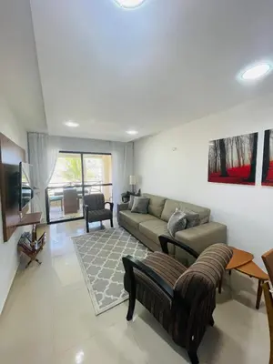Uma área de estar em Apartamento Aquaville Resort