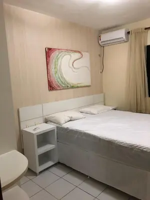 Uma cama ou camas num quarto em Ap Luxo 208 e 207 Prox Beach Park