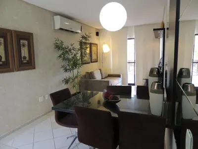 Uma área de estar em Ap Luxo 208 e 207 Prox Beach Park