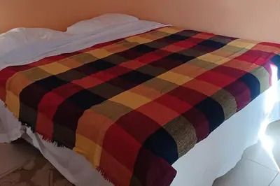 Uma cama ou camas num quarto em Apartamento à beira-mar. Beachfront apartment