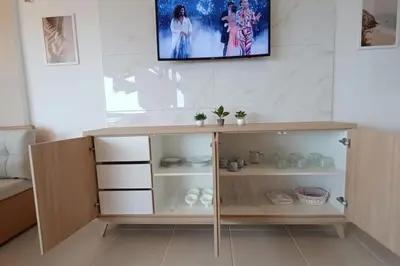 A cozinha ou kitchenette de Flat Malua - Apartamento Pé Na Areia Com Vista Mar Taíba-CE