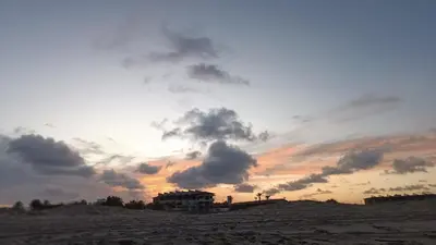 O nascer ou o pôr do sol visto a partir do apartamento