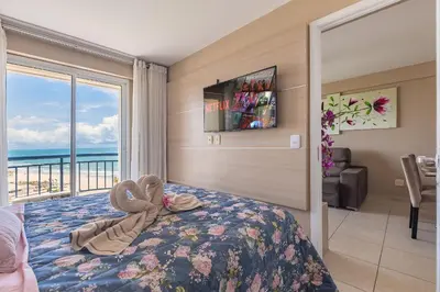 Uma cama ou camas num quarto em BeachVillage 1507N - Praia do Futuro por Carpediem