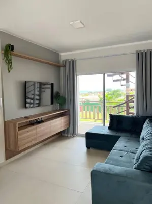 Uma área de estar em Flat Canoa Quebrada com Terraço