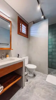 Uma casa de banho em Luau Hotel