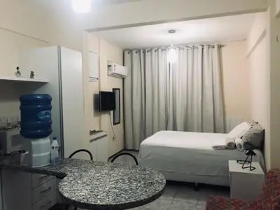 Uma cama ou camas num quarto em Stúdio Beira Mar