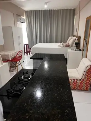 Uma área de estar em Stúdio Beira Mar