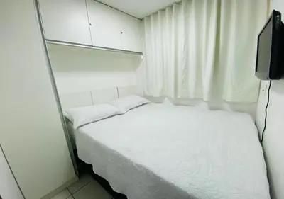 Uma cama ou camas num quarto em Beach Class Fortaleza