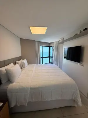 Uma cama ou camas num quarto em Iate Plaza Hotel