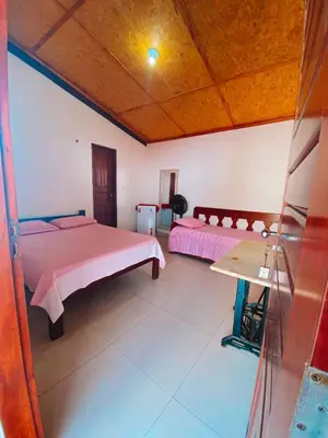 Uma cama ou camas num quarto em Flechimar Suítes