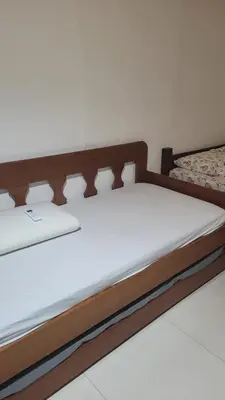Uma cama ou camas num quarto em Flechimar Suítes