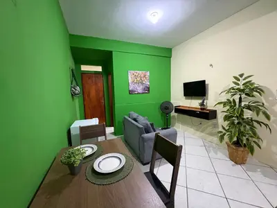Uma televisão e/ou sistema de entretenimento em Apartamento completo e central! Casa Joana!