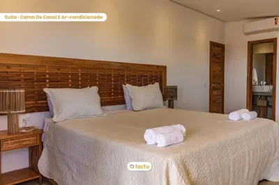 Uma cama ou camas num quarto em Casa Canoé Fortim Piscina de Luxo em Condomínio