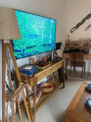 Uma televisão e/ou sistema de entretenimento em Casa carcará em Barrinha