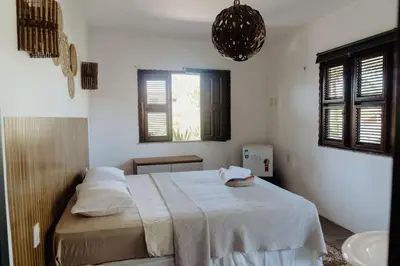 Uma cama ou camas num quarto em Pousada Brisa Del Mar