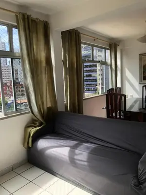 Uma área de estar em Apartamento praia Beira Mar